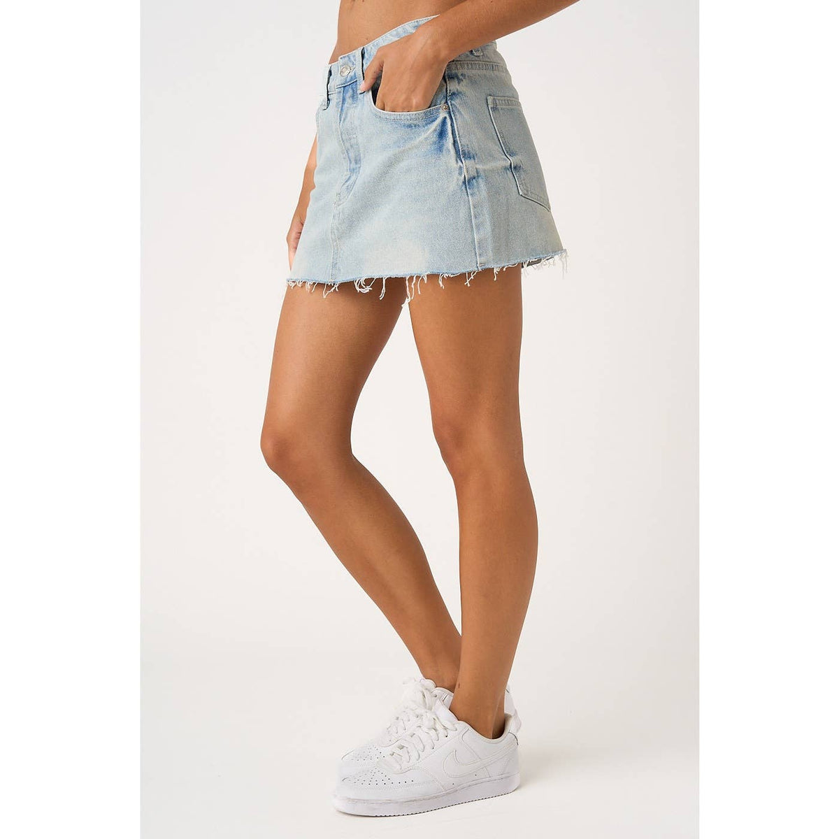 DISTRESSED HEM WASHED DENIM MINI SKIRT