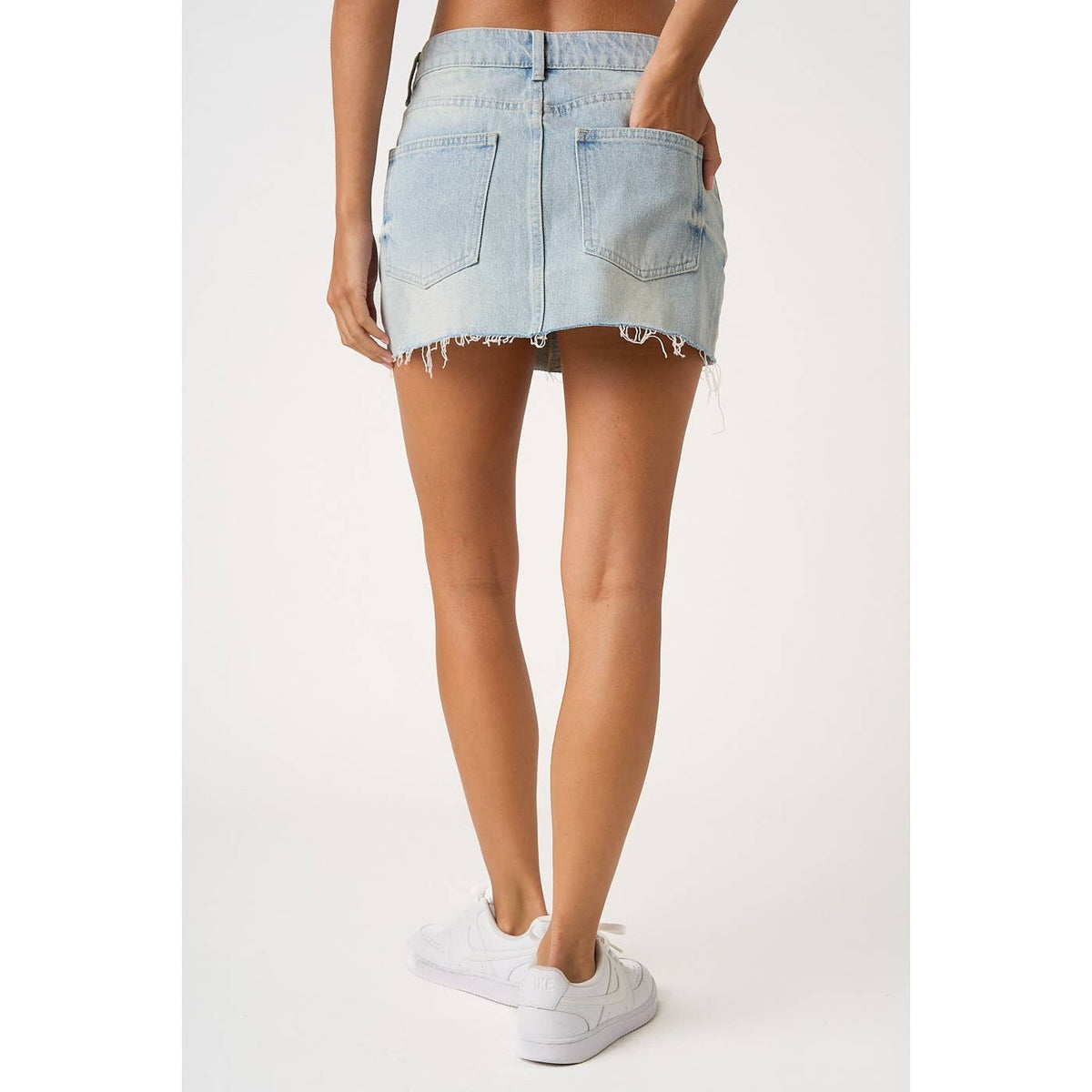 DISTRESSED HEM WASHED DENIM MINI SKIRT