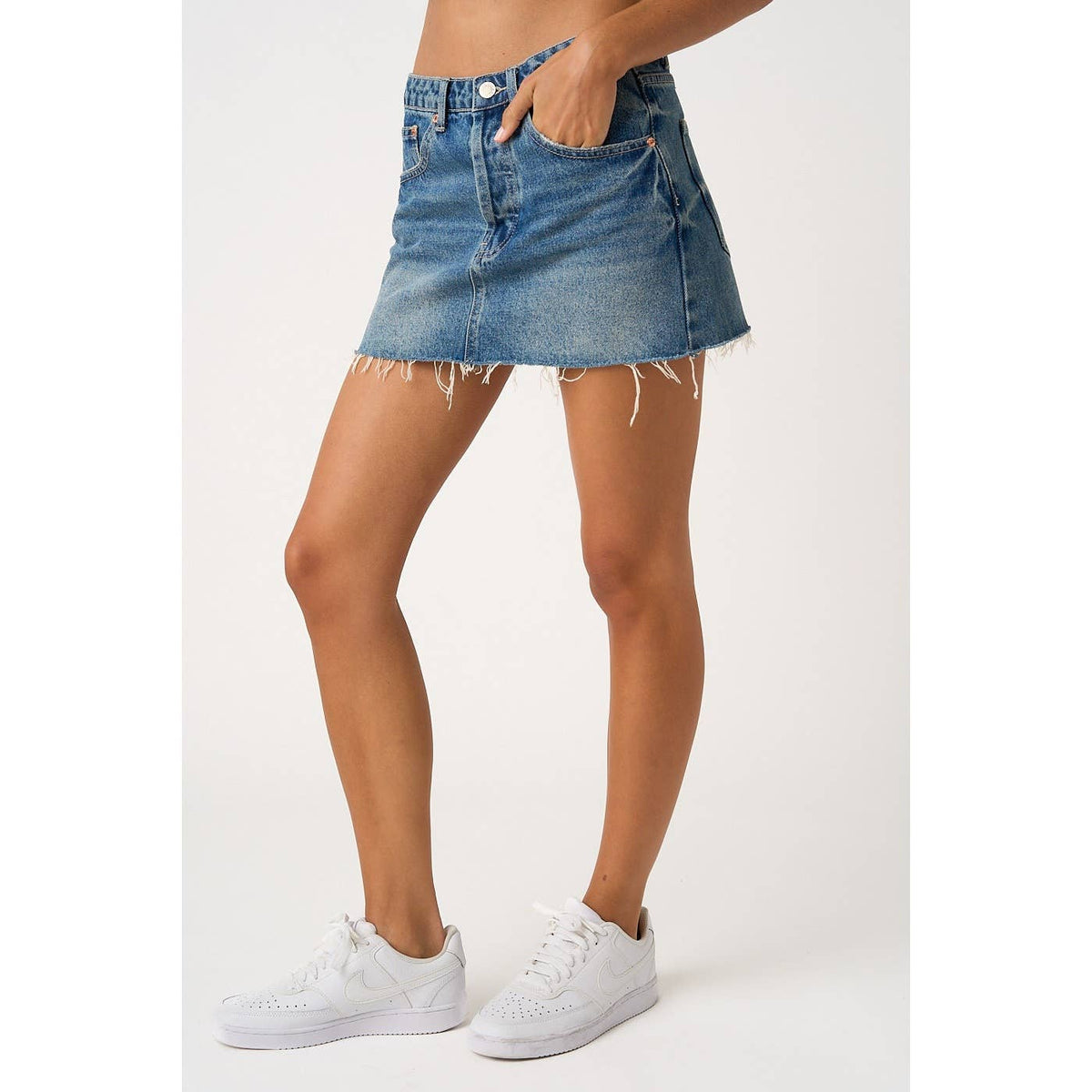 DISTRESSED HEM WASHED DENIM MINI SKIRT